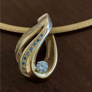 Genuine 14k yellow gold pendant with white and blue diamonds
